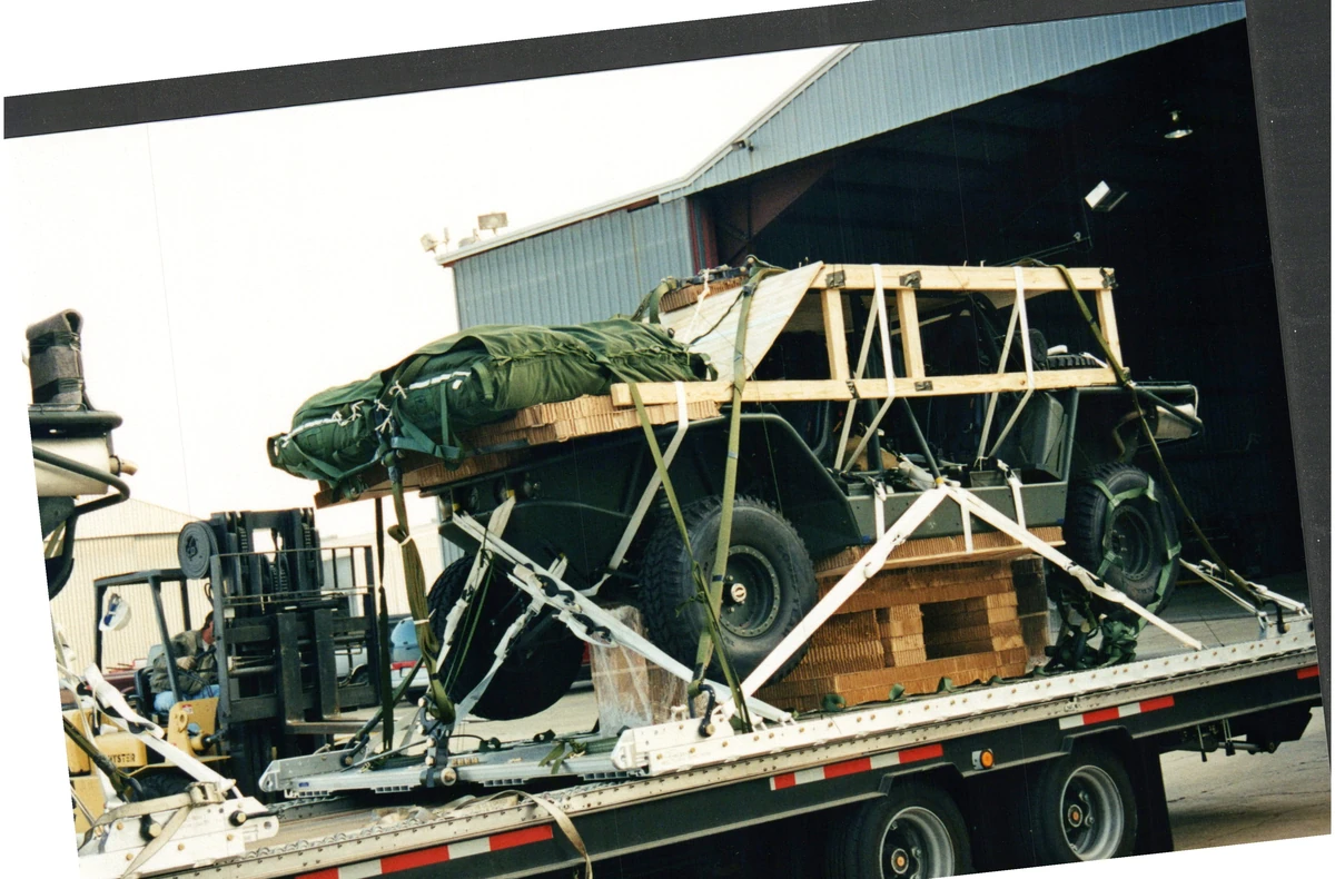 An early vehicle secured in a protective timber frame on a transport pallet