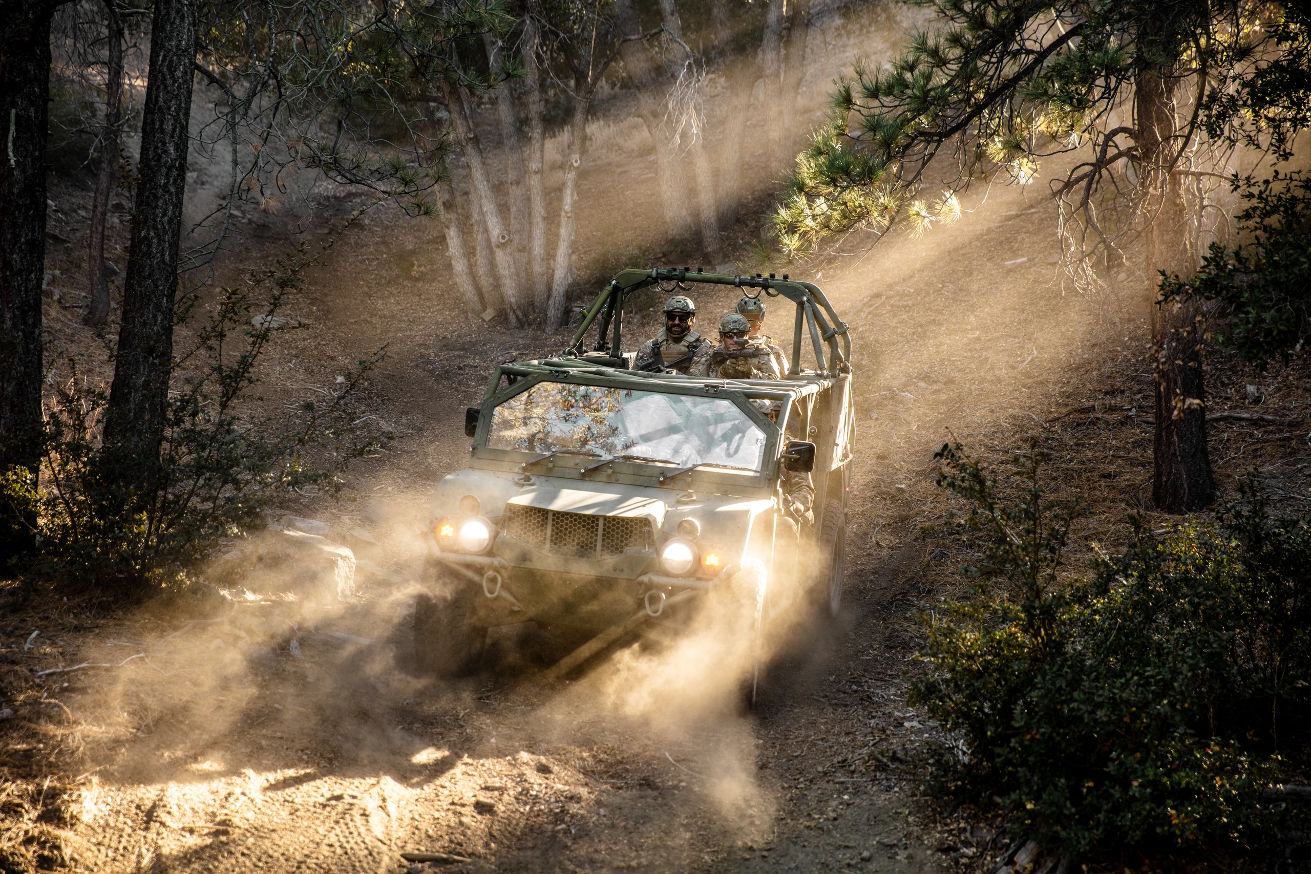 A Flyer test vehicle on a wooded trail